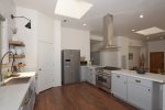 Fully equipped with high end appliances and granite counters